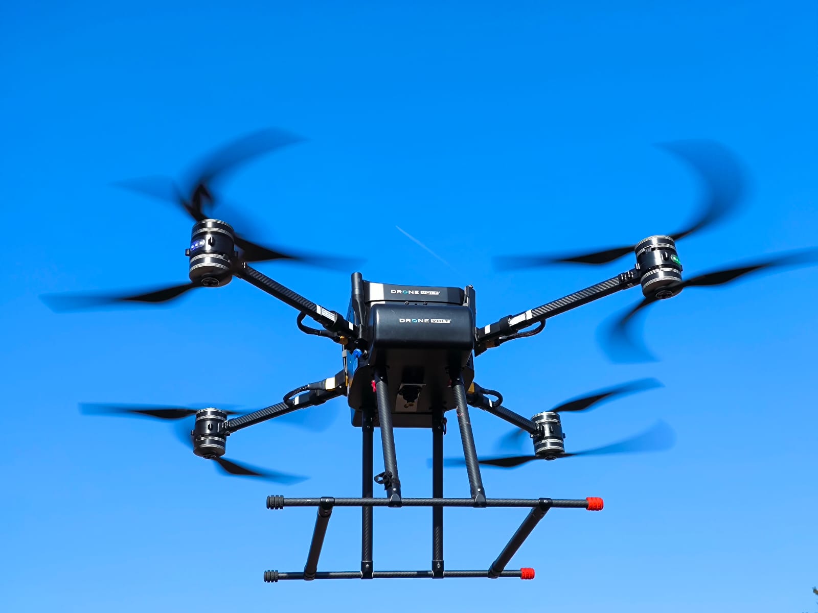 CleanAlta 6-rotor industrial cleaning drone close-up in flight